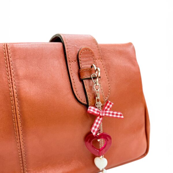 Colgante cinta y corazón