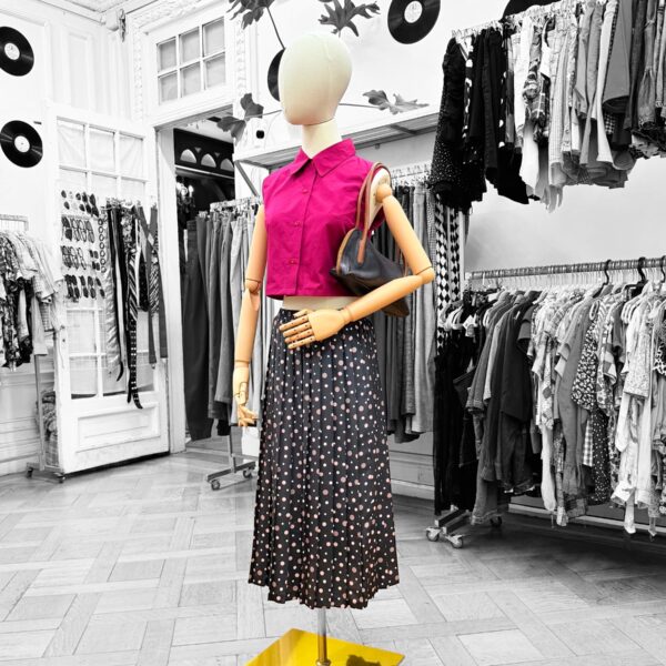 Falda midi vintage negra con lunares